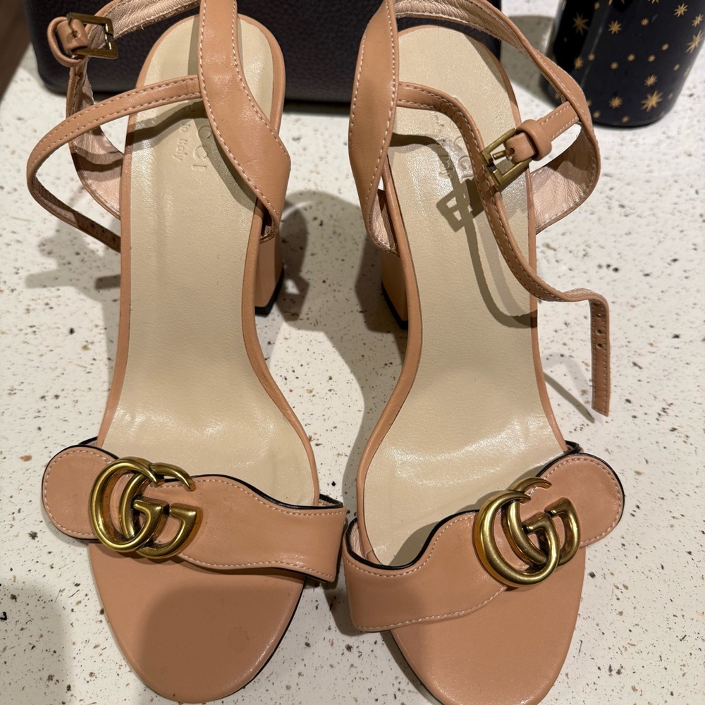 Elegant Tan Sandals with Gold Accents
Gucci